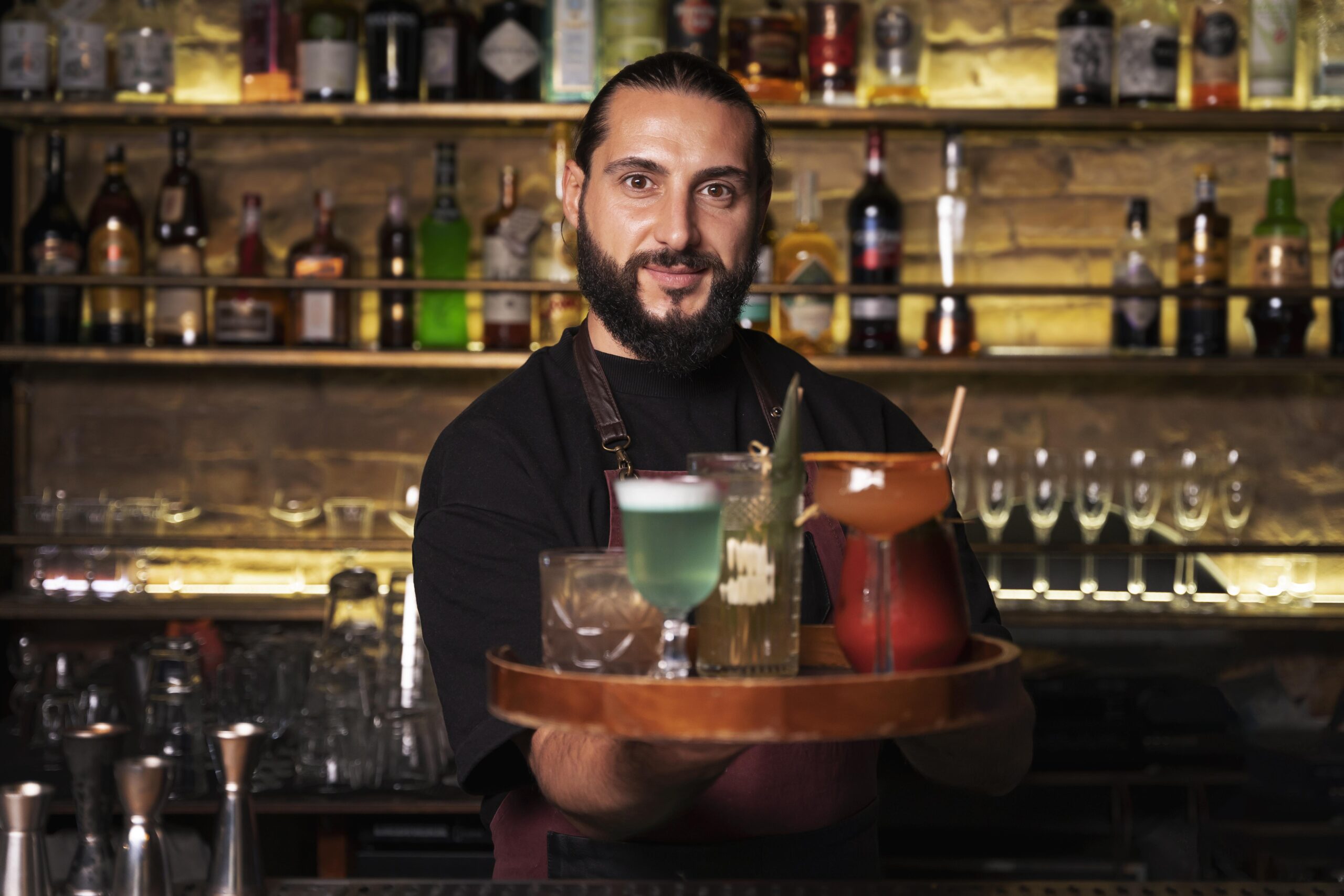 close-up-bartender-cocktail-shaker